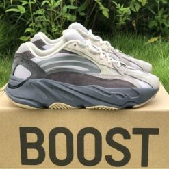 Adidas Yeezy Boost 700 V2 Tephra replica sneakers showcasing a stylish design with a combination of grey and black hues, featuring a chunky silhouette and comfortable cushioning perfect for fashion-forward sneaker enthusiasts.