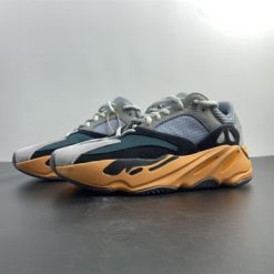 Adidas Yeezy Boost 700 Wash Orange replica sneakers featuring a vibrant orange and gray colorway, premium materials, and a sleek silhouette perfect for casual wear and sneaker enthusiasts.