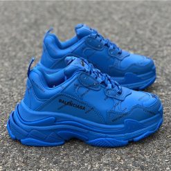 Balenciaga Allover Logo Triple S Blue replica sneakers showcasing a stylish design with a vibrant blue color and bold logo detailing, perfect for sneaker enthusiasts seeking high-quality replicas.
