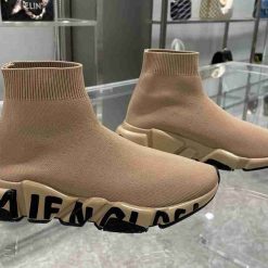 Balenciaga Graffiti Speed Beige Black Sneaker replica sneakers showcasing a stylish design with graffiti print, featuring a blend of beige and black colors for a trendy look.