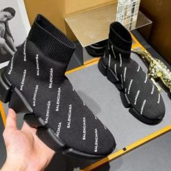 Balenciaga Speed Allover Logo Black Sneaker replica sneakers featuring a sleek design with an all-over logo pattern, perfect for fashion-forward individuals seeking high-quality alternatives.