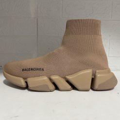 Balenciaga Speed 2.0 Beige Sneaker replica sneakers featuring a sleek design, stretchy knit upper, and iconic chunky sole, perfect for fashion-forward enthusiasts seeking high-quality alternatives.