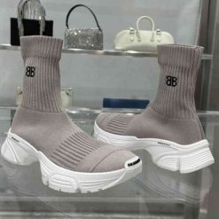 Balenciaga Speed 30 Grey Sneaker replica sneakers showcasing a sleek design with a grey fabric upper, contrasting white outsole, and a comfortable sock-like fit, perfect for fashion-forward individuals seeking high-quality alternatives.