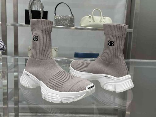 Balenciaga Speed 30 Grey Sneaker replica sneakers showcasing a sleek design with a grey fabric upper, contrasting white outsole, and a comfortable sock-like fit, perfect for fashion-forward individuals seeking high-quality alternatives.