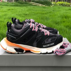Balenciaga Track Black White Orange Sneaker replica sneakers featuring a sleek design with bold color accents, showcasing high-quality craftsmanship and stylish aesthetics.
