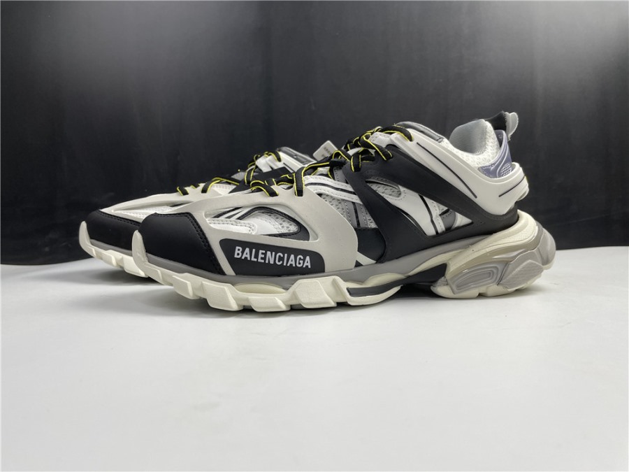 Balenciaga Track Black White Yellow Sneaker high-quality replica sneakers showcasing a stylish and modern design with a blend of black, white, and yellow accents.