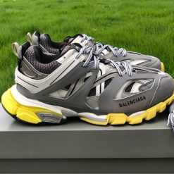 Balenciaga Track Grey White Yellow Sneaker, high-quality replica sneakers featuring a stylish design with a mix of grey, white, and yellow colors, perfect for sneaker enthusiasts looking for trendy footwear.