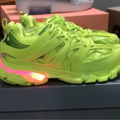 Balenciaga Track LED Fluorescent Green Sneaker replica sneakers showcasing a vibrant fluorescent green color, intricate design details, and high-quality craftsmanship ideal for sneaker enthusiasts.