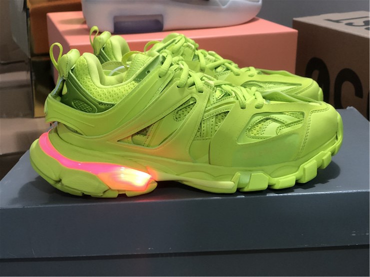 Balenciaga Track LED Fluorescent Green Sneaker replica sneakers showcasing a vibrant fluorescent green color, intricate design details, and high-quality craftsmanship ideal for sneaker enthusiasts.