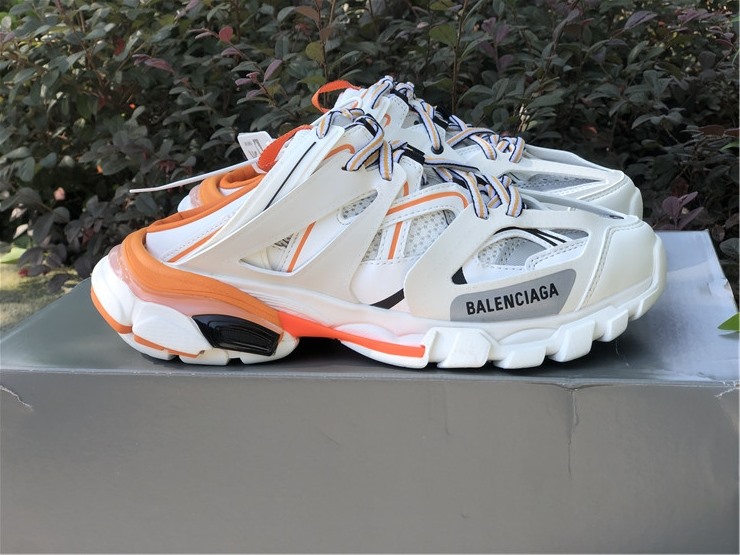 Balenciaga Track Mule White Orange Sneaker replica sneakers featuring a sleek design, vibrant color accents, and premium detailing for fashion enthusiasts seeking stylish footwear alternatives.