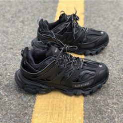 Balenciaga Track Triple Black Sneaker replica sneakers featuring a sleek all-black design, premium materials, and a chunky silhouette, ideal for stylish streetwear enthusiasts.