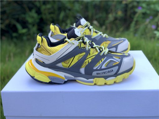Wholesale Luxury Balenciaga Track Yellow Sneaker featuring a vibrant yellow colorway, designed as high-quality replica sneakers with intricate detailing and a sporty aesthetic, perfect for fashion-forward enthusiasts.
