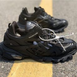 Balenciaga Track 2 All Black Sneaker replica sneakers showcasing a sleek, modern design with a black silhouette and intricate detailing, perfect for sneaker enthusiasts seeking high-quality alternatives.