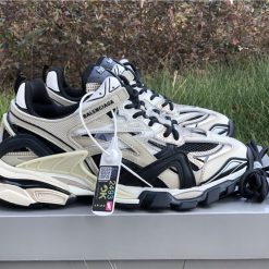 Balenciaga Track 2 Beige Black Sneaker - high-quality replica sneakers featuring a modern design with a blend of beige and black colors, ideal for fashion-forward individuals seeking stylish footwear.