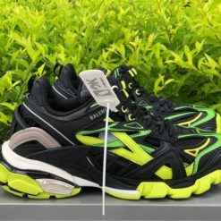 Balenciaga Track 2 Black Fluorescent Yellow Sneaker high-quality replica sneakers featuring a stylish blend of black and fluorescent yellow colors, designed for comfort and high-performance wear.