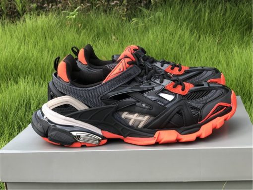 High-quality replica sneakers featuring the Balenciaga Track 2 in a striking black and orange colorway, showcasing a modern design and superior craftsmanship.