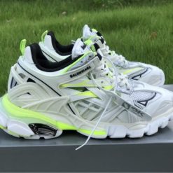 Balenciaga Track 2 White Fluorescent Yellow Sneaker replica sneakers showcasing a stylish design with a vibrant color combination, ideal for fashion enthusiasts seeking high-quality alternatives.