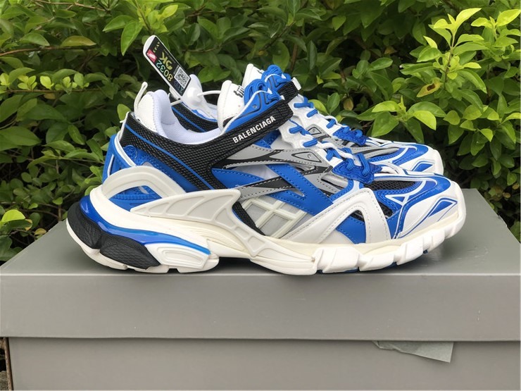 Balenciaga Track 2 White Royal Blue Sneaker replica sneakers featuring a stylish design with a mix of white and royal blue colors, made for fashion enthusiasts seeking high-quality alternatives.