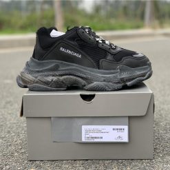 Balenciaga Triple S Clear Sole Black replica sneakers featuring a stylish black upper, oversized silhouette, and unique transparent sole for a trendy and fashionable look.