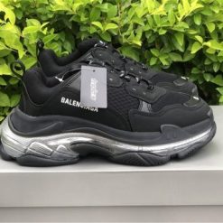 Balenciaga Triple S Clear Sole Black Silver replica sneakers featuring a bold design with a chunky silhouette, clear sole, and a striking black and silver colorway, perfect for fashion-forward sneaker enthusiasts.