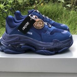 Balenciaga Triple S Clear Sole Blue replica sneakers featuring a stylish design with a prominent clear sole, perfect for fashion enthusiasts seeking quality and comfort in their footwear.