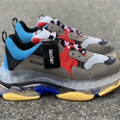 Balenciaga Triple S Clear Sole Blue Red high-quality replica sneakers featuring striking blue and red colorway, oversized silhouette, and transparent sole design for a trendy urban look.