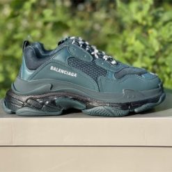 Balenciaga Triple S Clear Sole Dark Green replica sneakers featuring a chunky silhouette, dark green mesh and leather upper, and transparent sole, ideal for sneaker enthusiasts seeking high-quality shoes.