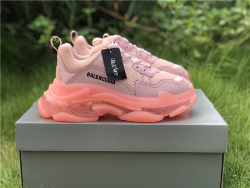 SEO Alt Text: "Balenciaga Triple S Clear Sole Light Pink replica sneakers featuring a chunky silhouette, clear sole design, and soft pink color, ideal for trendy footwear enthusiasts seeking stylish and high-quality shoes."