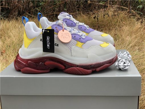 Alt Text: "Balenciaga Triple S Clear Sole sneakers in vibrant purple, yellow, and red colors, featuring a chunky design and transparent sole, perfect for those seeking stylish and high-quality replica sneakers."