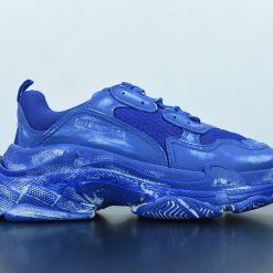 Balenciaga Triple S Faded Blue Sneaker showcasing an aesthetically worn design, perfect for sneaker enthusiasts seeking high-quality replica sneakers. The shoe features a combination of faded blue hues, textured materials, and the iconic chunky silhouette that Balenciaga is known for.