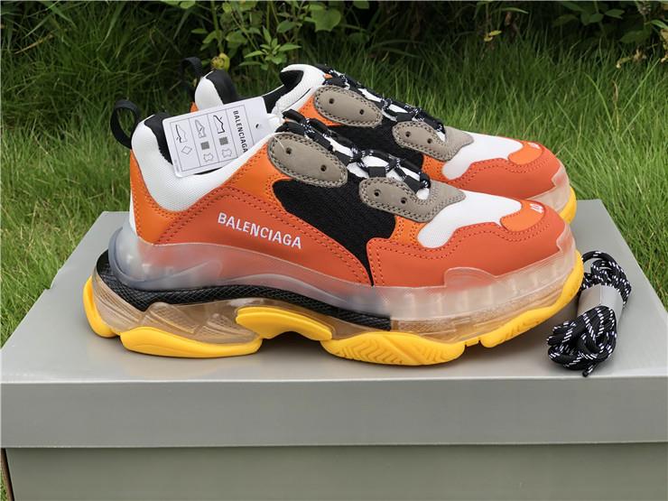 High-quality replica sneakers featuring the Balenciaga Triple S design in vibrant orange and yellow colors, showcasing a trendy and stylish look for sneaker enthusiasts.