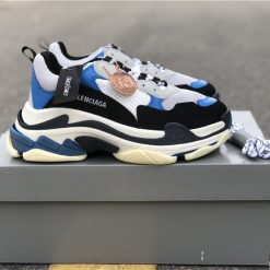 Balenciaga Triple S White Black Blue replica sneakers showcasing a stylish design with a chunky silhouette and a mix of vibrant colors, perfect for sneaker enthusiasts seeking high-quality shoes.