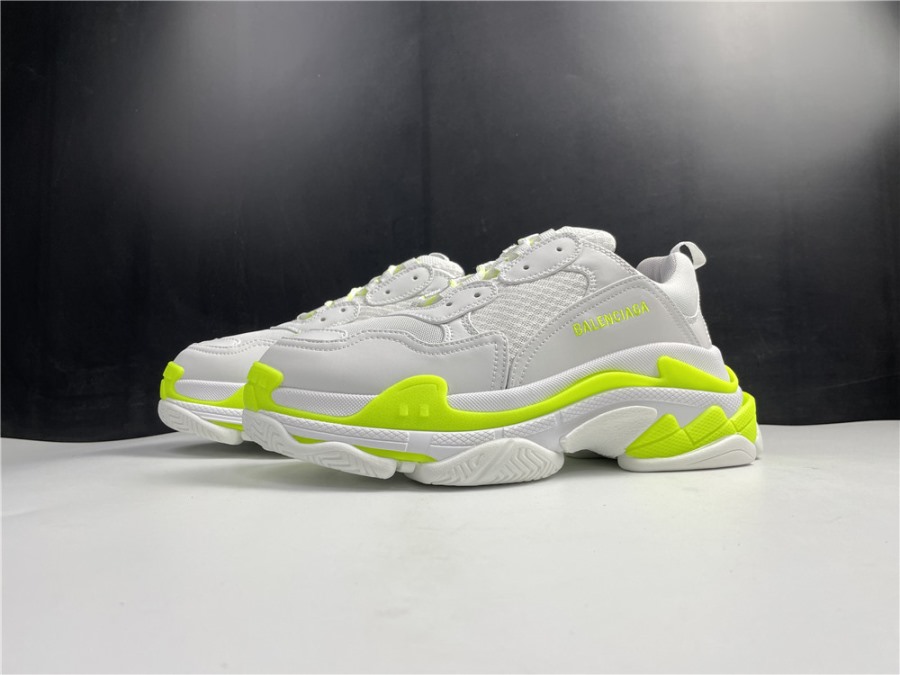 Alt text: "Balenciaga Triple S White Fluorescent Green replica sneakers featuring a bold color combination and chunky silhouette, perfect for those seeking stylish shoes that replicate the original design."