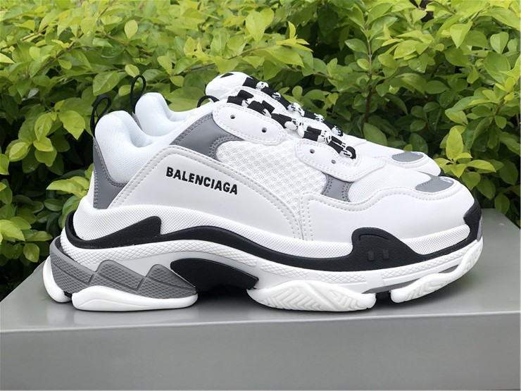 Alt text: "Balenciaga Triple S White Grey Sneakers displayed, showcasing high-quality replica sneakers for sale, featuring a chunky silhouette, premium materials, and stylish design details."