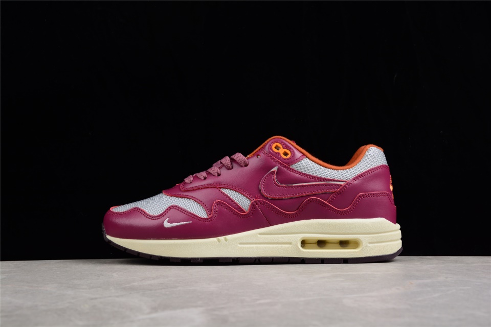 Patta x Nike Air Max 1 Night Maroon replica sneakers featuring a rich maroon colorway, premium materials, and iconic design elements, perfect for sneaker enthusiasts and collectors.