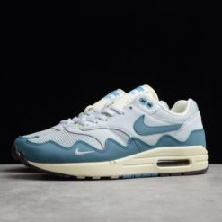 Patta x Nike Air Max 1 Waves Noise Aqua replica sneakers showcasing a vibrant color scheme with aqua and tonal wave patterns, designed for sneaker enthusiasts and collectors.