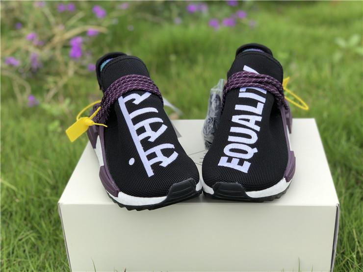 Pharrell X Adidas NMD Human Race Black Purple replica sneakers featuring a sleek black upper with vibrant purple accents and distinctive branding for a stylish, eye-catching look.