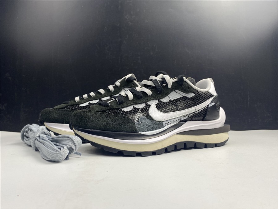 Sacai x Nike Pegasus VaporFly SP Black White CI9928 001 high-quality replica sneakers featuring a sleek design with a layered upper and cushioning for enhanced performance.
