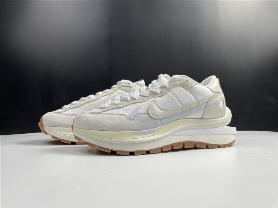 Sacai x Nike Vapor Waffle White Sail replica sneakers featuring a sleek design with layered materials, perfect for sneaker enthusiasts seeking high-quality alternatives.