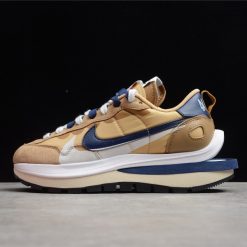 Sacai x Nike Vaporwaffle Sesame Blue Void high-quality replica sneakers showcasing a unique design with layered materials in shades of sesame and blue, featuring a mixed silhouette and a distinctive waffle sole.