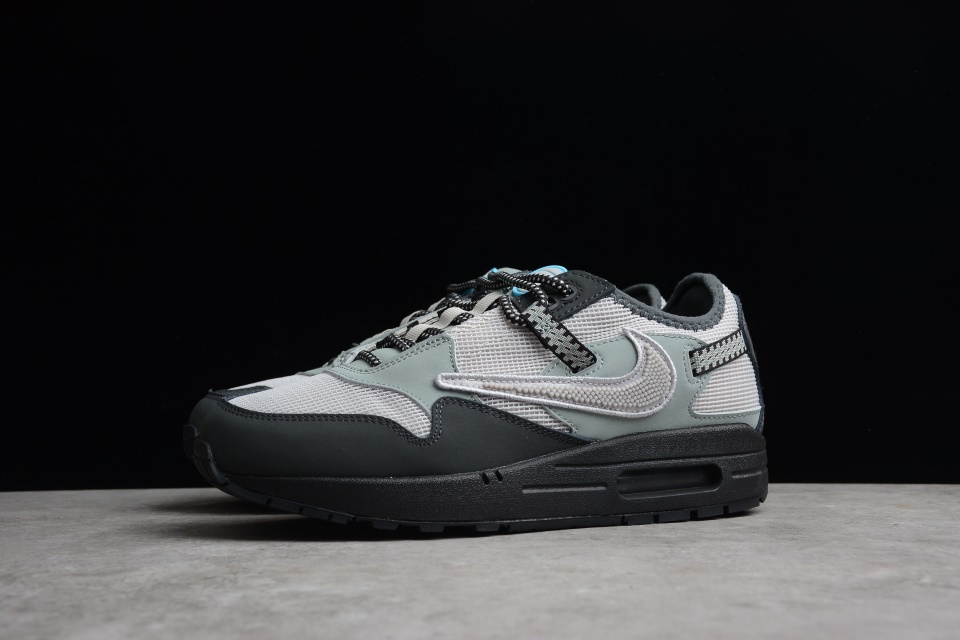 Close-up of the Travis Scott x Nike Air Max 1 Cave Stone replica sneakers, showcasing their unique beige and brown colorway, premium materials, and iconic design elements. Perfect for sneaker enthusiasts looking for high-quality shoes that replicate this popular model.