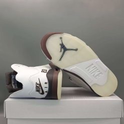 A Ma Maniére x Jordan 5 Retro OG 'Black Collective' high-quality replica sneakers featuring a sleek black design with premium materials and unique branding elements, perfect for sneaker enthusiasts and collectors.