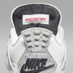 High-quality replica sneakers featuring the Air Jordan 4 Retro model, showcasing a detailed design with iconic colorways and authentic branding.