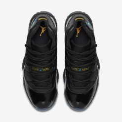 Air Jordan 11 Gamma Blue replica sneakers featuring a sleek black upper with vibrant gamma blue accents and a shiny patent leather finish, ideal for sneaker enthusiasts looking for high-quality replicas.