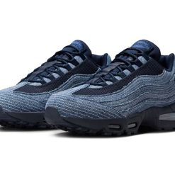 High-quality replica sneakers featuring the Levi's Nike Air Max 95 collaboration, showcasing a stylish design blending iconic branding and contemporary apparel aesthetics.