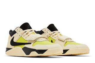 High-quality replica sneakers featuring Jordan Travis Scott Jumpman design in bright cactus colorway, showcasing vibrant details and craftsmanship.