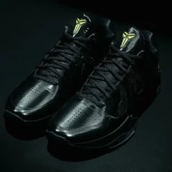 High-quality replica sneakers featuring the Kobe 5 Protro Year of the Mamba in a sleek Triple Black colorway, designed for basketball enthusiasts and sneaker collectors.