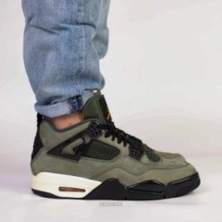 High-quality replica sneakers featuring the Undefeated Air Jordan 4 design, showcasing a combination of premium materials and iconic colorways for a stylish look.