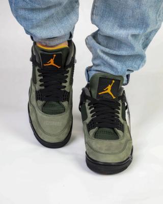 Undefeated Air Jordan 4 replica sneakers featuring a unique colorway, premium materials, and intricate design details, perfect for sneaker enthusiasts and collectors.