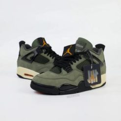 Undefeated Air Jordan 4 replica sneakers featuring a unique colorway and premium detailing, perfect for sneaker enthusiasts and collectors.